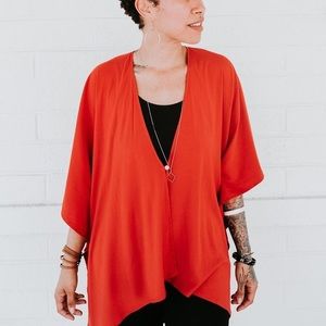 Sseko Designs Multi-way Shawl in Tiger Lilly